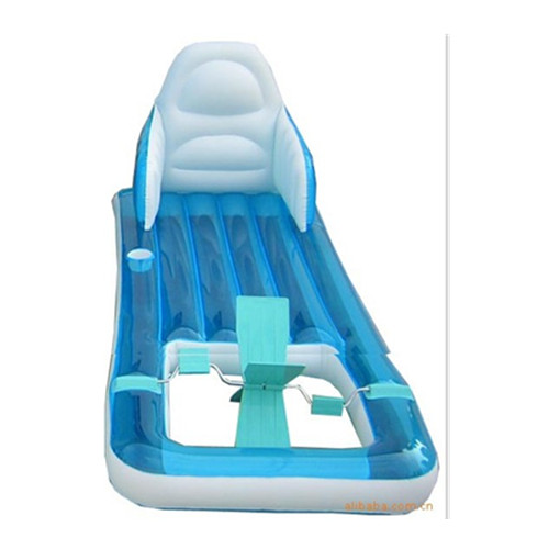 Inflatable floating bed with foot pump