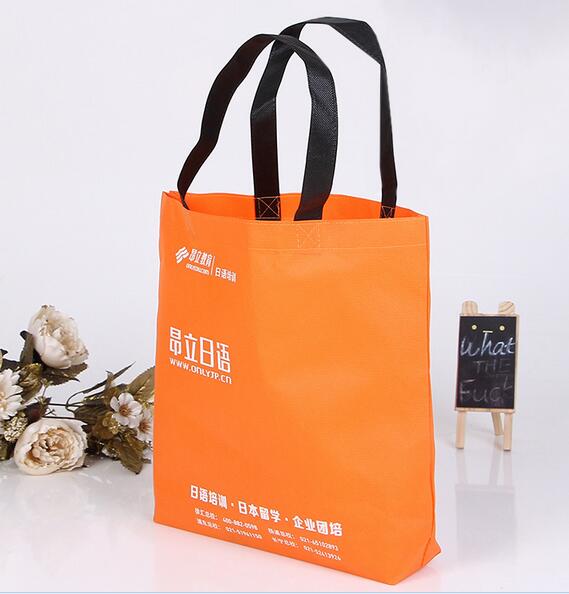 Wholesale orange color customized non woven bag