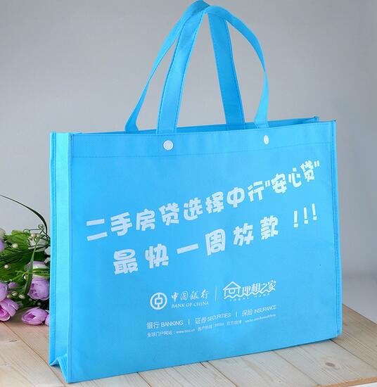 Wholesale blue color non woven bag with handle