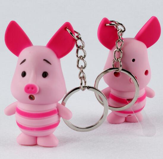 Promotional pink pig shape with sound and led keychain