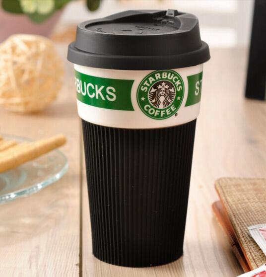 Promotional black color ceramic mug with silicone grap and silicone lid