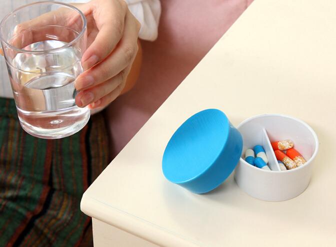 Portable cup shape two level pill box or pill organizer