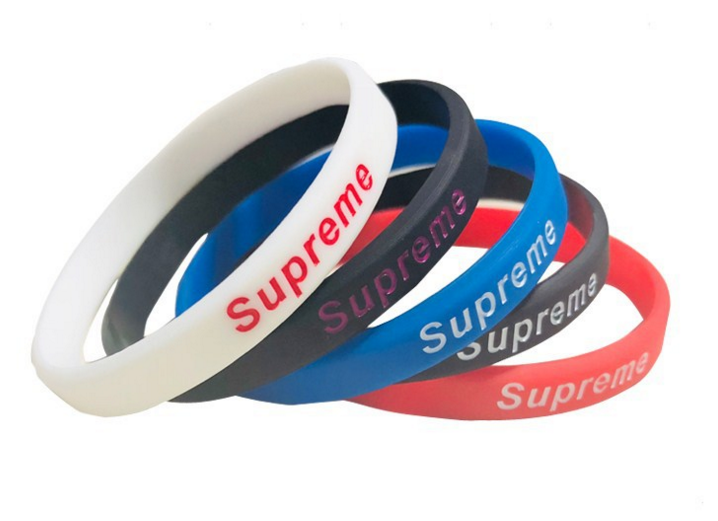 Promotional white color customize emboss and fill color silicone wristband