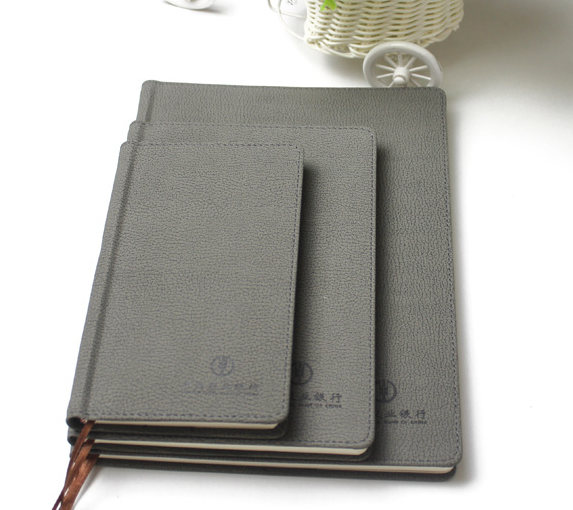 Customized grey color pu notebook with customize emboss logo