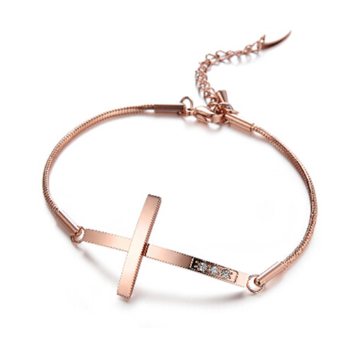 Crucifix or cross shape woman gold bracelet