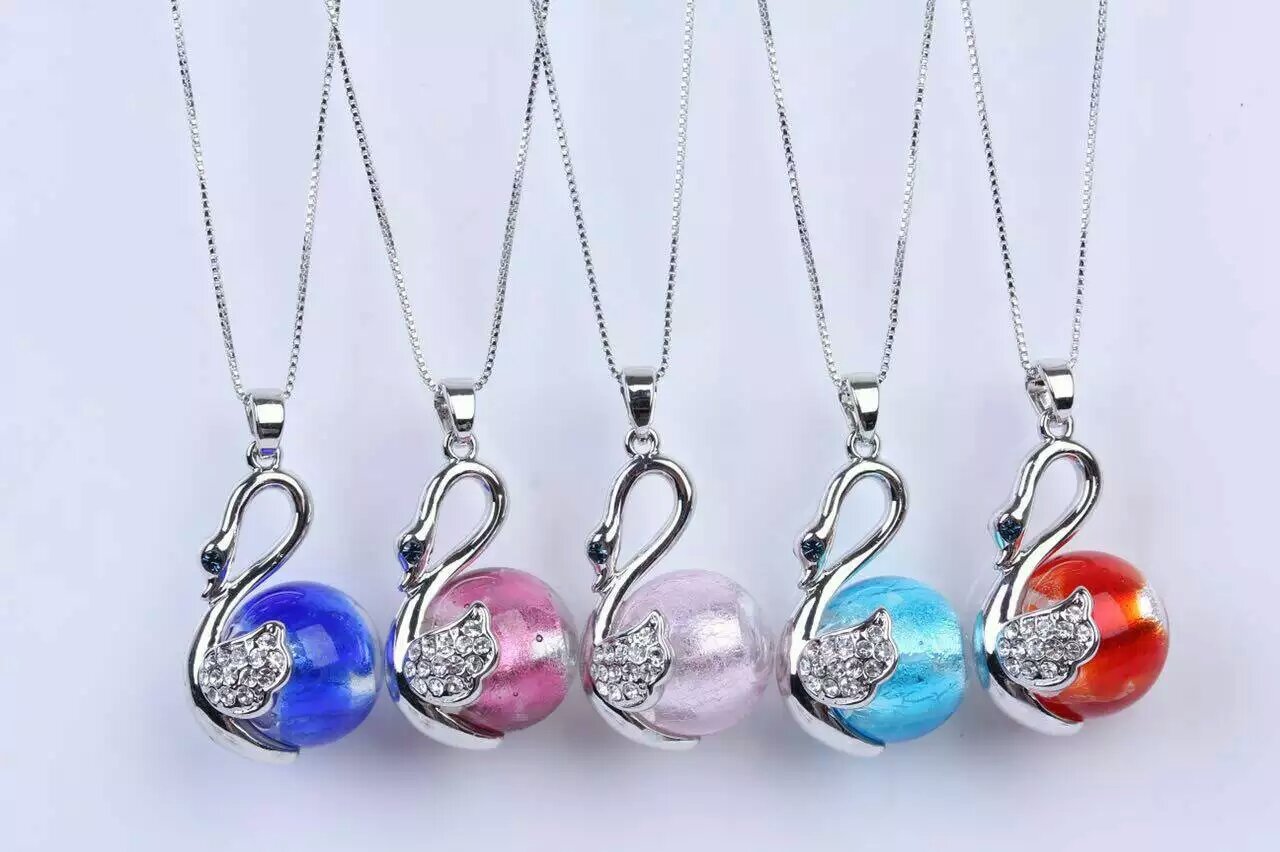 Wholesale swan or duck shape essencial oil bottle necklace