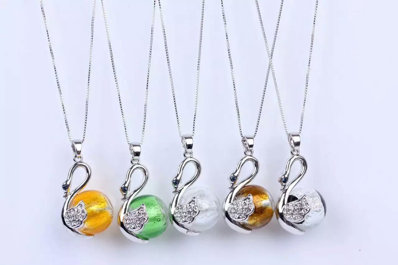 Wholesale swan or duck shape essencial oil bottle necklace