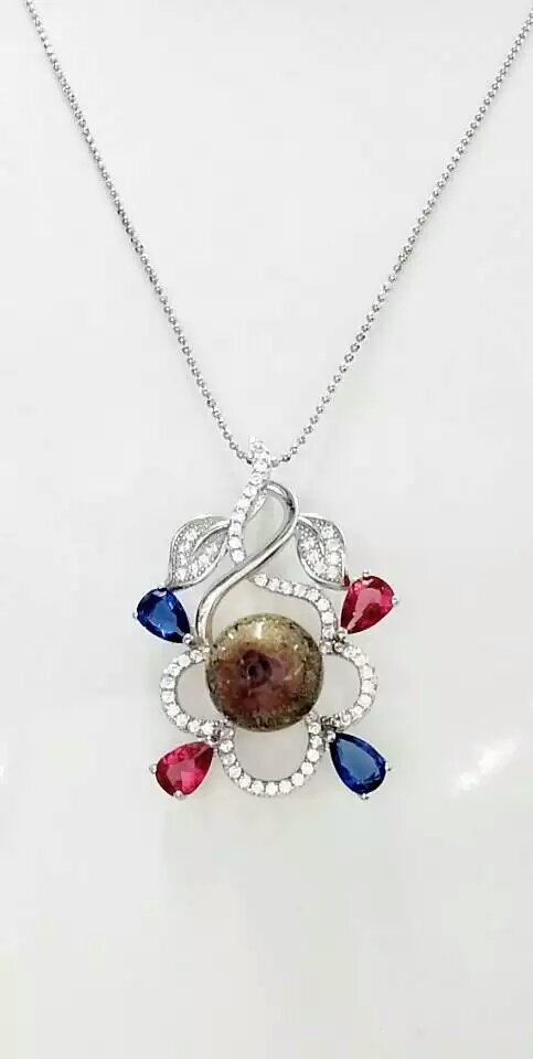 Wholesale fashonal new style flower alloy frame essencial oil brown bottle diffuser necklace