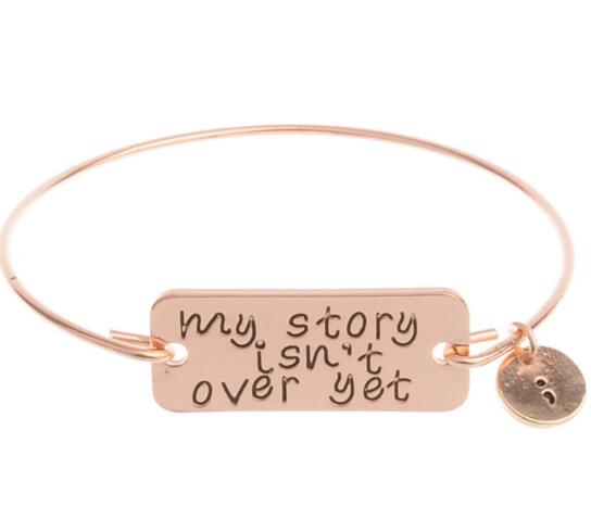 My story isnt get word gold color alloy bracelet