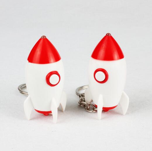 Promotional rocket shape with led and sound keychain