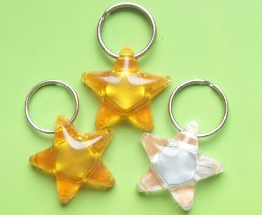 Promotional star shape plastic led leychain